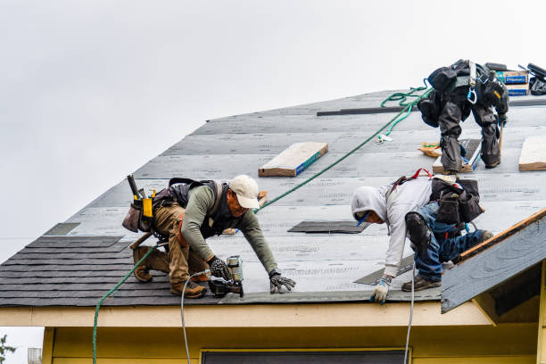 Professional Roofing technician working in Copiague, NY